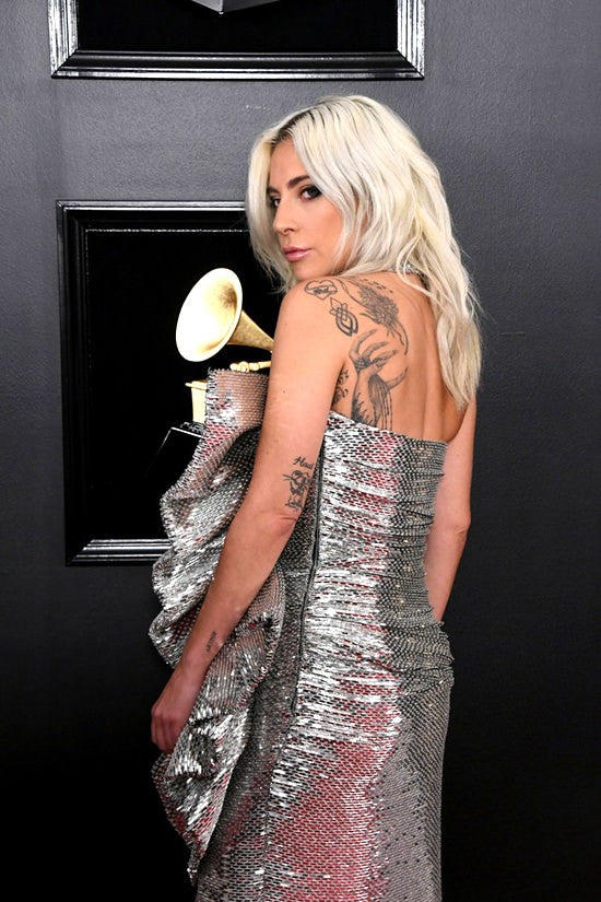 gaga silver dress Lady Gaga dazzles in silver at 'A Star Is Born' Los Angeles premiere