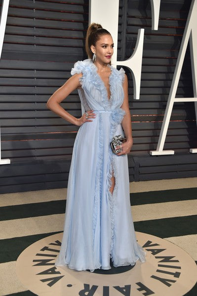 jessica alba silver dress Jessica Alba dazzles in a silver gown during a rare red carpet appearance with husband Cash Warren at the Vanity Fair Oscars Viewing Party. We've got more pics and all of the